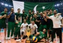 Pakistan national volleyball team celebrating after winning the Central Asian Volleyball Championship 2026 with the trophy and Pakistani flag.
