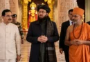 "Afghan Taliban Minister Attaullah Omari visiting a Hindu temple in New Delhi, India, surrounded by Indian officials and a Hindu priest."