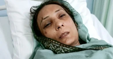 Lahore Kahna tuition center roof collapse incident survivor injured female teacher Amila lying on a hospital bed at Lahore General Hospital.