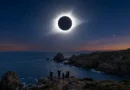 Total solar eclipse on 12 August showing glowing sun corona over coastal landscape