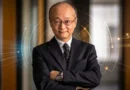 Masatsugu Asakawa, President of the Asian Development Bank (ADB), smiling in a formal suit.