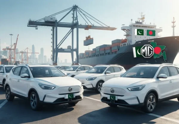 White MG cars parked at a port ready for export from Pakistan to Bangladesh with a cargo ship in the background.