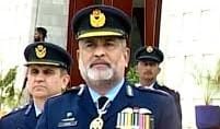 Air Vice Marshal Hassan Faisal delivering a speech at Mazar-e-Quaid during Pakistan Air Force guards changing ceremony.