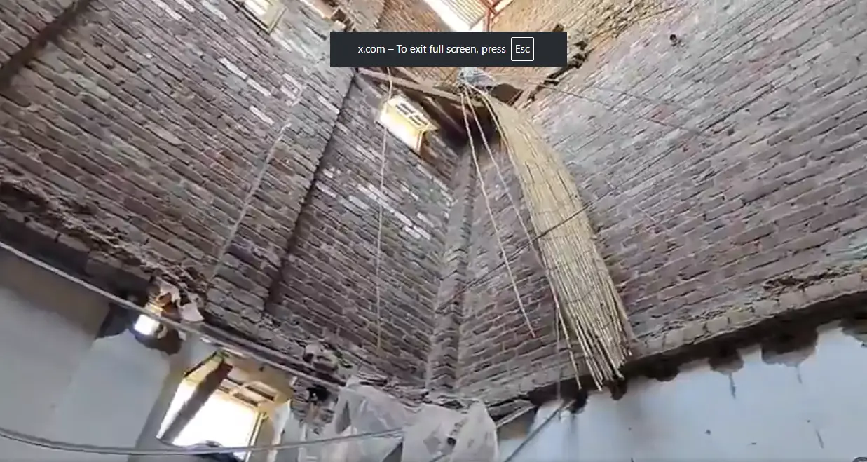 Peshawar school roof collapse site showing debris and grief-stricken parents demanding justice in KP Pakistan.